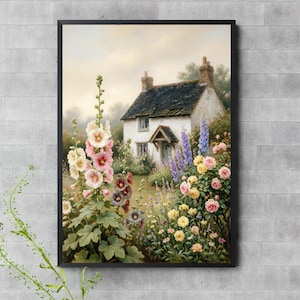 May include: A framed wall art print depicting a white cottage with a dark roof surrounded by a lush garden. Tall pink and white hollyhocks stand in the foreground, while yellow and pink roses and purple delphiniums fill the garden beds.