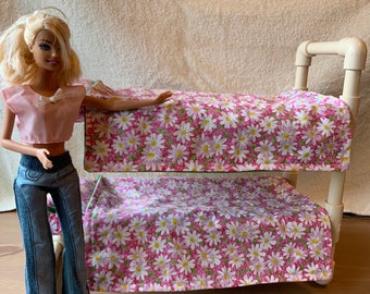 Doll Bunk Beds For Barbie Dolls comes with matching pillows and blankets.