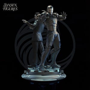 May include: A detailed statue featuring two figures: a man in a suit and a metallic Iron Man suit. The figures stand on a circular base with a geometric pattern. The statue is predominantly silver and black, with the text "Jansen Figures" in the upper left corner.
