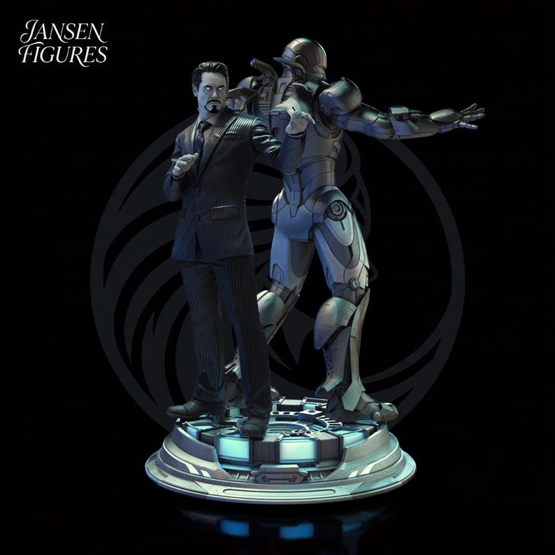 May include: A detailed statue featuring two figures: a man in a pinstripe suit and a metallic armored figure. The figures stand on a circular platform with a glowing blue design. The text "Jansen Figures" is in the upper left corner.