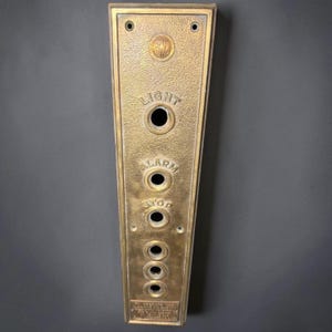 antique 1920’bronze elevator control panel