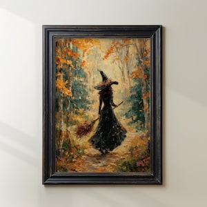 May include: A framed oil painting depicting a figure in a dark dress and pointed hat walking through an autumn forest. The figure carries a broomstick, surrounded by vibrant orange and yellow foliage on trees and the ground, all in a black frame.
