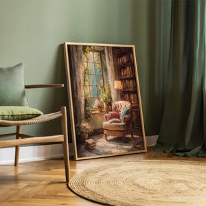 May include: A framed painting depicts a cozy reading nook with a window, armchair, and bookshelf. The artwork features warm tones, with a focus on the interior details. A wooden chair with a green pillow and a jute rug are in the foreground.