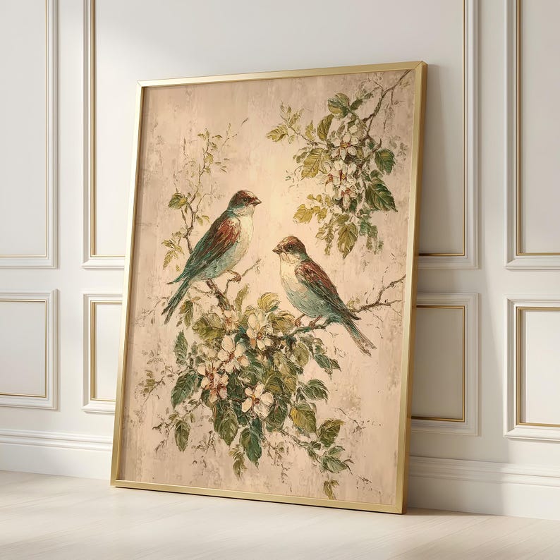 May include: A framed vertical wall art print featuring two birds perched on flowering branches against a textured beige background. The birds have blue and brown plumage, and the branches are adorned with green leaves and white blossoms.