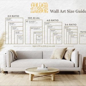 May include: Wall art size guide with dimensions in inches and centimeters. The guide includes 2:3, ISO A1-A4, 4:5, 3:4, and 11x14 ratios. A sofa, coffee table, and decorative items are in the foreground.