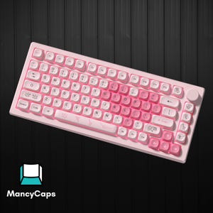 May include: A mechanical keyboard with a light pink frame and a gradient color scheme transitioning from white to pink keys. The keycaps feature QWERTY layouts, Japanese characters, and various origami-style animal line art icons on specific keys.