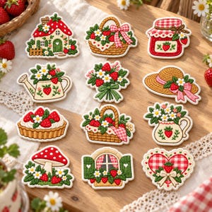 May include: A collection of twelve embroidered patches featuring strawberry-themed designs, including a cottage, baskets, a jam jar, a watering can, a bouquet, a sun hat, a tart, a pitcher, a mushroom, a window, and a heart, all with red and green details.