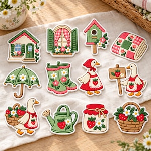 May include: A collection of twelve embroidered fabric patches featuring garden and cottage themes, including a house, window, birdhouse, quilt, umbrella, boots, geese with strawberries, a watering can, a jam jar, and a basket of strawberries.