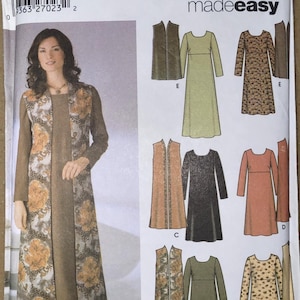 May include: A Simplicity 5344 sewing pattern envelope featuring illustrations of long-sleeved dresses and sleeveless vests in various solid colors and floral patterns. The front shows a model wearing a brown dress with a floral vest.