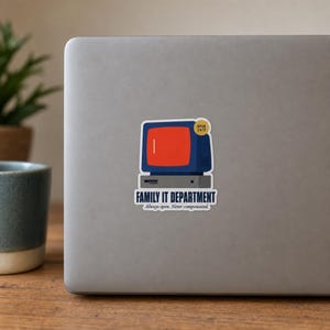 May include: A rectangular sticker featuring a vintage dark blue computer monitor with a bright red screen and a small yellow circle reading OPEN 24/7. Below the monitor is a gray base with the text FAMILY IT DEPARTMENT and Always open. Never compensated.