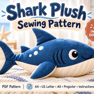 May include: A blue and cream shark plush toy with white circular spots and black gill slits. The text reads Shark Plush Sewing Pattern, Instant Download, PDF Pattern, A4, US Letter, A0, Projector, Instructions. The shark has a white underbelly.