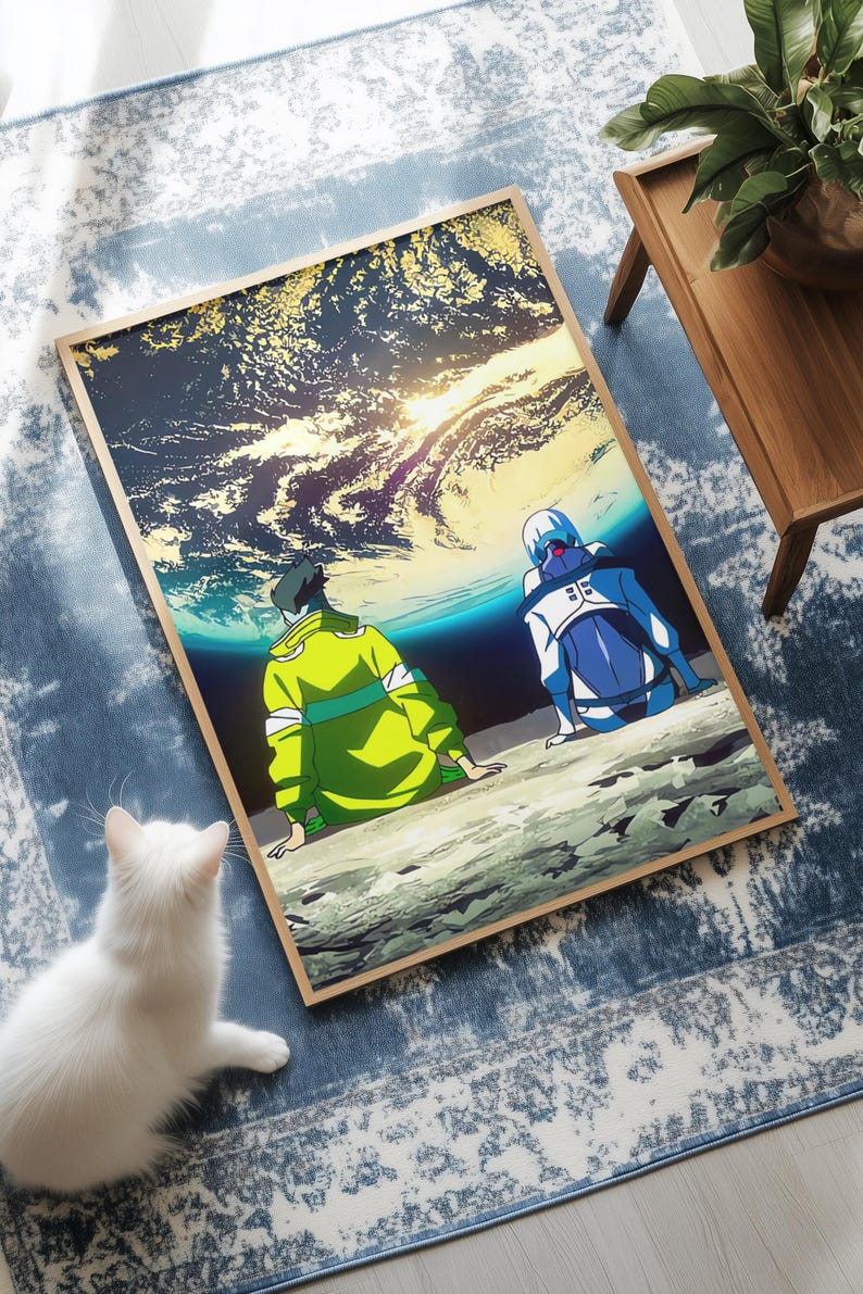 Puede incluir: Un cuadro enmarcado con dos figuras de estilo anime contemplando un vibrante paisaje c&oacute;smico con un sol brillante. Una figura lleva una chaqueta verde, la otra un traje azul. El cuadro est&aacute; sobre una alfombra azul estampada, con un gato blanco en primer plano.