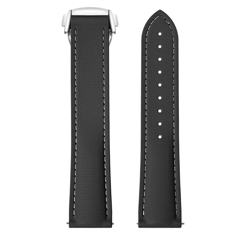 May include: A black watch strap with white stitching. The strap has a textured surface and a silver metal clasp. The strap is shown in two pieces, one with holes for the buckle and the other with the clasp.