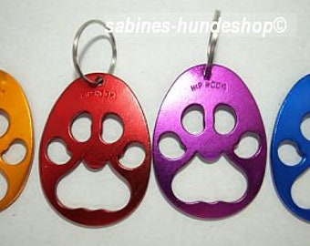 bottle opener, key chain, dog paw