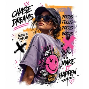 May include: A graphic t-shirt design featuring a person wearing a cap and sunglasses, surrounded by graffiti-style text including CHASE DREAMS, FOCUS, BELIEVE IN YOURSELF, VIBES, GOOD ENERGY, and MAKE IT HAPPEN, with a pink smiley face and paint splatters.