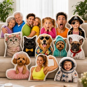 May include: A collection of custom-shaped throw pillows featuring printed portraits of people and pets, including a cat with a flower crown, a dog in a tuxedo, a dog in a floral shirt, a dog in a hoodie, a dog in a chef outfit, and a child in a spacesuit.