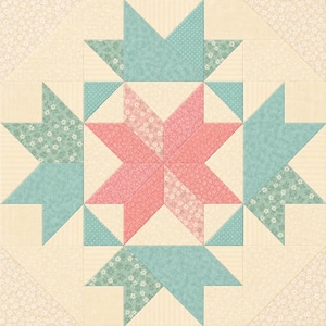 May include: A square quilt block featuring a central eight-pointed star in shades of pink with floral patterns. The star is surrounded by four teal-coloured star points with white floral and dot motifs, set against a cream-coloured background.