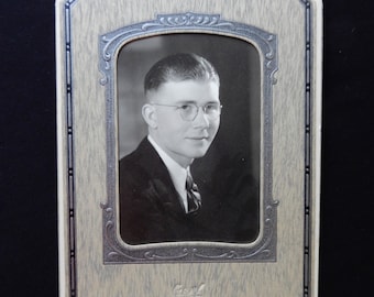 A quiet young man, vintage portrait in standing frame, stands 5.5" X 8", handsome double matting, silver, cream and black, faux wood grain