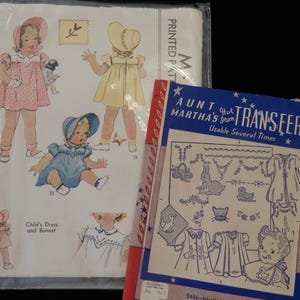 May include: Two vintage sewing patterns. One pattern shows illustrations of a child's dress and bonnet in pink, yellow, and blue. The other pattern is red, white, and blue with the text "Aunt Martha's Hot Transfer" and illustrations of infant wear.