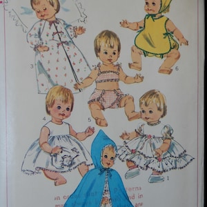 May include: A vintage sewing pattern for making doll clothes. The pattern includes six different outfits for a 16-inch doll, including a nightgown, a swimsuit, a dress, a cape, and a bonnet.