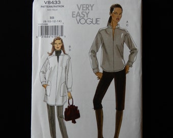 Size 8 to 14, Very Easy Vogue 8433, pullover tunic with collar, long cuffed sleeves, back yoke and pleat, elastic waist, slim tapered pant