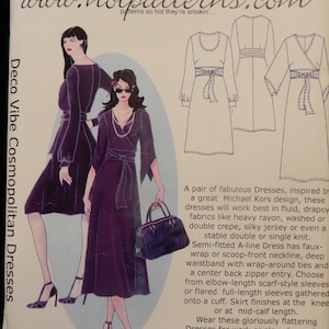 May include: A sewing pattern for Deco Vibe Cosmopolitan Dresses. The pattern features illustrations of dresses with wrap-around ties, A-line silhouettes, and various sleeve lengths. The website www.hotpatterns.com is visible.