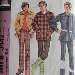 May include: Vintage McCall's pattern envelope featuring illustrations of three men's shirt-jacket and pants outfits. The outfits include a yellow jacket with plaid pants, a red and black plaid shirt, and a blue plaid suit. The envelope reads "Recommended for Knits."