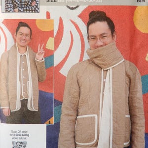 May include: A sewing pattern advertisement featuring a person modeling a quilted jacket and scarf. The pattern is labeled "knowME by mimi g" and includes size information. The image also includes a QR code for a video tutorial.