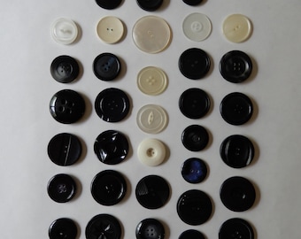 It's All Black and White, 35 buttons, scant 1" to 1.5" wide, sew through style, plastic, no duplicates, crafting, sewing, good condition