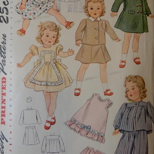 May include: Vintage Simplicity sewing pattern featuring illustrations of children's clothing. The pattern includes drawings of dresses, coats, and pajamas. The text "Size 18" and "25c" are visible. The pattern is printed on each piece.