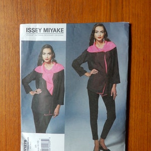 May include: A sewing pattern for a black and pink top and pants by Issey Miyake. The pattern is from Vogue Patterns and is for sizes 6-8-10-12.