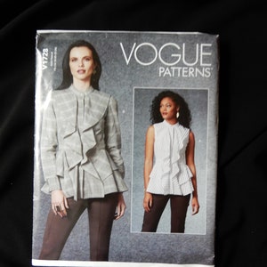 Size 8 to 16, Vogue 1728 blouse with peplum, cascading flounce down front, banded waist, sleeveless or long sleeved, narrow standing collar