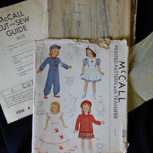 McCall&#39;s 1015, 22&quot; tall Little Lady doll, clothes pattern including Air Raid Warden, Red Cross nurse, 1942, uncut, complete with transfers
