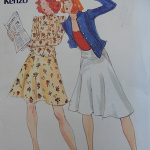 May include: A vintage sewing pattern envelope featuring two illustrations of outfits. One figure wears a yellow floral dress with a high collar. The other wears a blue jacket, red top, and white skirt. Text includes "Butterick", "Size 10", and "Young Designer Kenzo".