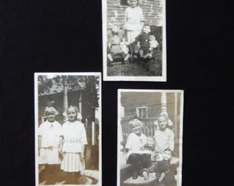 Cousins Playing Dolls, 1917, Irene and Bernice, two 2 3/8" X 4.25", one 2.25" X 3/8", little girls playing outside with dolls and chairs