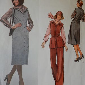 May include: Vintage sewing pattern featuring three different women's outfits. The outfits include a gray button-down dress, a rust-colored pantsuit with a matching hat and scarf, and a gray dress with a belt. The illustrations showcase 1970s fashion.