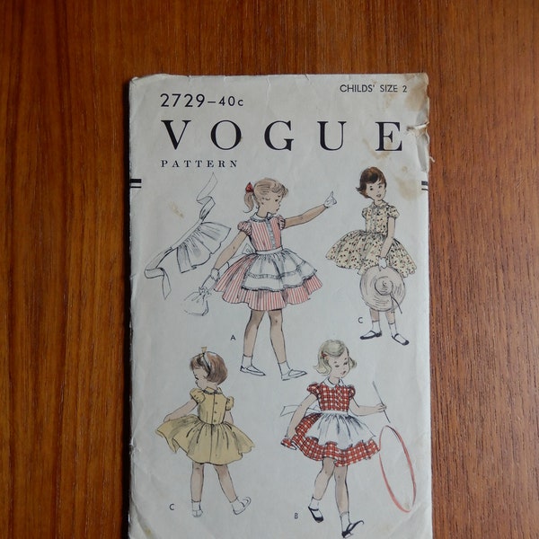 Size 2, Vogue 2729 from 1955, dress, fitted bodice with inset band, full gathered skirt, Peter Pan collar, gathered apron with optional trim