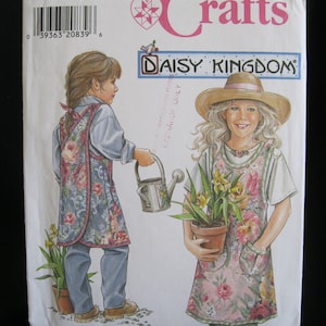 Daisy Kingdom child size apron pattern, Simplicity 7856, cut pattern includes sizes small and medium for chests 23&quot; to 28&quot;, no size large
