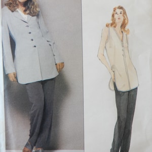 May include: A sewing pattern for a long, light gray blazer with a collar and buttons, and a pair of gray pants. The pattern is from the Anne Klein Collection, Vogue American Designer.