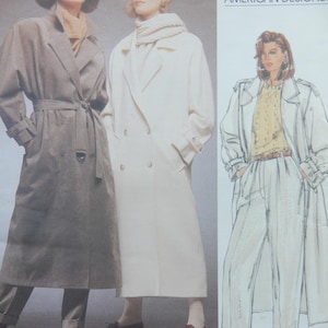May include: Vogue Patterns American Designer sewing pattern featuring three women in stylish coats and pants. The coats are in shades of beige and gray. The pattern includes the text "blassport ltd."