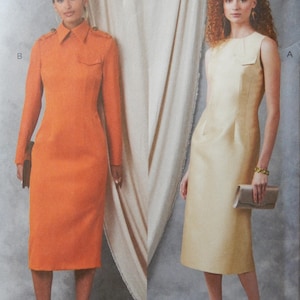 May include: A sewing pattern envelope featuring two dress designs: a long-sleeved orange dress with a collar, shoulder epaulets, and a chest pocket, and a sleeveless cream-colored sheath dress with a high neckline and a small chest pocket detail.