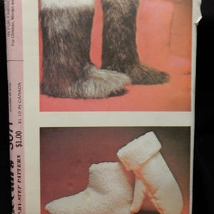 May include: A vintage sewing pattern for making fur-lined boots and mittens. The pattern is called "Anchors" and costs $1.00. The pattern is printed on a pink background with a picture of the finished boots and mittens.