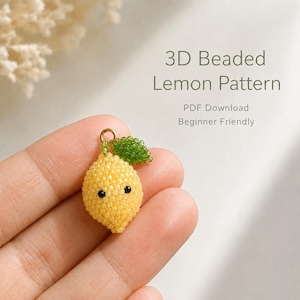 May include: A 3D beaded lemon charm featuring yellow beads, a green beaded leaf, and two small black bead eyes. The text reads 3D Beaded Lemon Pattern, PDF Download, Beginner Friendly. The charm includes a small gold metal jump ring at the top.