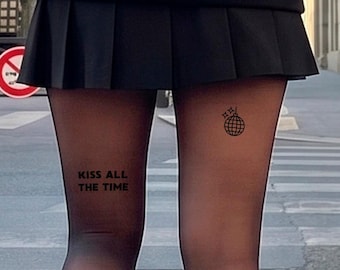 Kiss All The Time doorschijnende panty's, transparante panty's, opvallende statement panty's, trendy modepanty's, zwarte panty's, modieuze panty's