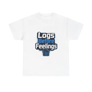 May include: White t-shirt with a blue and black graphic that reads "Logs Before Feelings." The design includes a stylized file icon. A casual tee for programmers and tech enthusiasts.