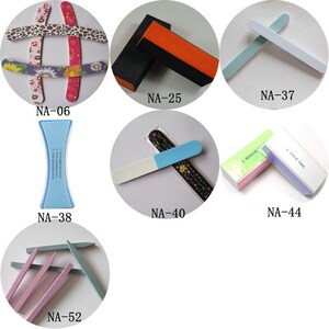 May include: Assortment of nail care tools, including emery boards with floral and animal print designs, nail buffers, and a nail shaping guide. Various colors and shapes are shown, with product codes visible.