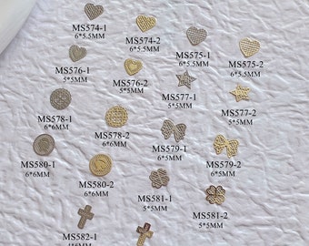 100pcs/bag Silver and Gold non-adhesive Soft Metal Slices Bow Cross Heart Shape Nail Art Decoration M42