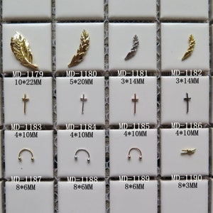 5pcs metal 3d encantos metal decoración hoja cruz pluma sonriendo forma deco uñas decoración DIY accesorio