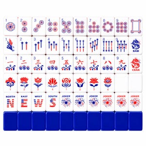 May include: A complete set of white Mahjong tiles with red and blue markings. The tiles feature various symbols, numbers, and Chinese characters. The set includes tiles marked with "BAM" and "CRAK", and "NORTH", "EAST", "WEST", "SOUTH", and "JOKER".