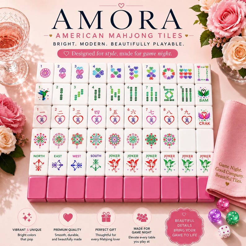 May include: A complete set of American Mahjong tiles with a pink base and white tiles. The tiles feature various symbols and numbers, with the word "AMORA" at the top. The set includes dice and a pink cloth.